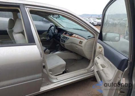 2005 Mitsubishi Lancer из США, поврежденный, VIN KA3AJ26E85U042110